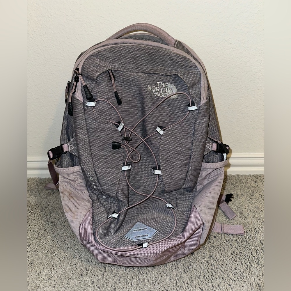 Grey and pink North Face Backpack